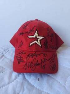 lot 4 image: Houston Astros cap with signatures - hat was signed when owner was at Walter Reed Hospital