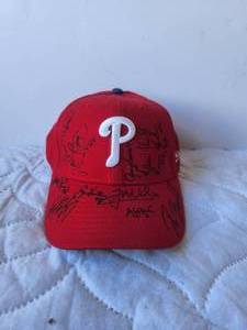 lot 18 image: Philadelphia Phillies cap with signatures - hat was signed when owner was at Walter Reed Hospital