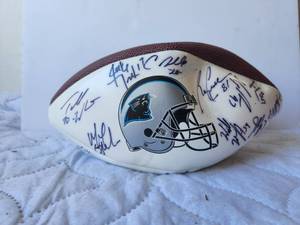 lot 30 image: Carolina Panthers football with signatures - football was signed when owner was at Walter Reed Hospital