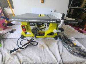 lot 9 image: Ryobi table saw - never used - new with no box