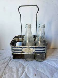 lot 139 image: Vintage Pepsi Cola metal 6 pack bottle carrier with 2 bottles