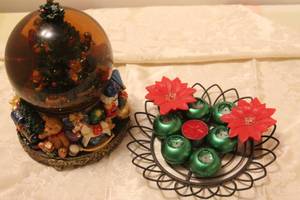lot 24 image: Beautiful Working Musical Snow Globe and Candle Holder Centerpiece with Green and Red Candles