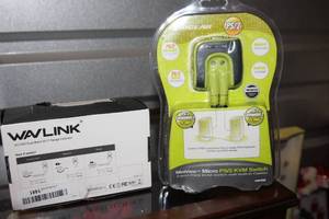 lot 27 image: New In Package Duo Band Wifi Range Extender and Micro KVM Switch