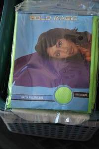 lot 103 image: Quantity of Gold Magic Satin Pillow Cases