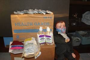 lot 120 image: Charlie Presents Health prevention Lot, Toilet seat cover Dispenser, Face Masks, Hand Sanitizer, and CPR mouth to mouth Shield ... All Items are NEW  CHARLIE NOT INCLUDED