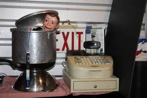 lot 121 image: Charlie Presents Royal 601 Cash Register, (tested and works properly), Ceiling mount EXIT sign, New webCamroom monitor,  Large Stock pot, large colander and skillet, and Digital Meat Thermometer  CHARLIE NOT INCLUDED