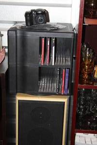 lot 128 image: One large Room Speaker in Excellent Condition, No holes or tears in speakers, one spinning CD holder with some various GE x-500 Camera in excellent condition