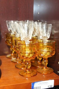 lot 136 image: Set of 8 Indiana Amber Thumbprint Wine Glasses and 8 Small Crystal Cordial Wine Glasses