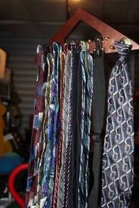 lot 147 image: Very Generous Selection of Mens Ties on a tie rack hanger as shown