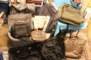 lot 157 image: Generous lot of Bags, Computer bags, camera bags, small make up bags in styles, brands, and colors as shown (Some are New)