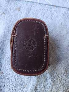 lot 107 image: Vintage General Electric - exposure meter - sold by the Army exchange