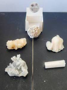 lot 9 image: Selection of mineral specimens and a Desert Rose