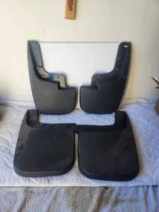 lot 72 image: Set of front and rear aftermarket mudflaps for