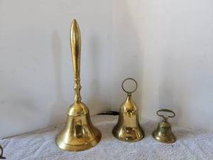 lot 160 image: Selection of Brass bells - one is missing clinker