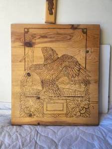lot 228 image: Wood burned carving on board of Eagle -  17 x 20 (SU)