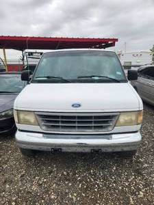 lot 150 image: 1996 White Ford Van- Has key but does not start - Vin#1FBJ531HXTHA05690 - Come and Preview - NO TITLE - Buyer will need to apply for lost or Bonded title. - SOLD AS IS