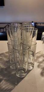 lot 61 image: Lot of 17 Glass Pint Glasses w Stamped Impression of Golf Ball on Bottom