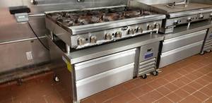 lot 112 image: 2-Piece Set Royal 8-Burner 48 Hot Plate Model RHP-48-8 & Arctic Air 48 Refrigerated Chef Base Model ARCB48Z. This Combined Set is worth over $11k new