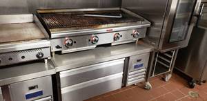 lot 113 image: 2-Piece Set Star-Max Lava Rock Gas Charbroiler 48 Model 6048CBF & Arctic Air 48 Refrigerated Chef Base Model ARCB48Z. This Combined Set is worth over $7k new
