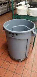 lot 124 image: Brute 55 Gallon Trash Can w Rolling Trash Can Dolly Attachment