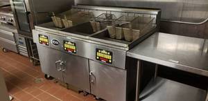 lot 115 image: Royal Range RFT-75-CM-3-BI Gas Fryer w Built-In Filtration System, Purchased new just over 1 year ago for over $40k