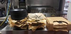 lot 131 image: Lot of 40 Round Food Serving Platters w A Big Box of Texas Themed Paper.  PERFECT FOR BBQ FANS