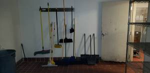 lot 151 image: Lof of Floor Cleaning Supplies, Brooms, Dust Pans & More.  HANGING RACK NOT INCLUDED