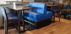 lot 75 image: 7-Piece Tall Restaurant Seating Set.  Includes 1 Double-Sided Bench, 2 Solid Wood Flat-Inside� Self Stabilizing Tables & 4 Matching Wooden Chairs