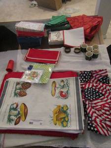 lot 51 image: New lot of Napkins and ring napkin holders, few different place matts