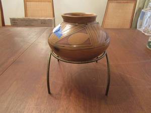lot 63 image: Colorado  Indian Pottery made in Towaoc, comes on a metal stand, 46