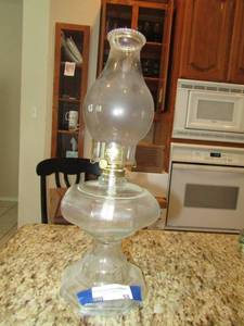 lot 68 image: 18 clear glass oil lamp vintage with globe top, great shape