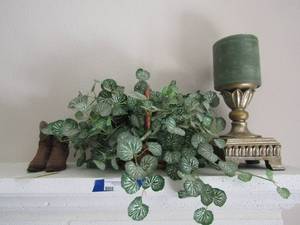 lot 85 image: Candle stand, fake ivy plant, set boots labeled part of old cowboy boots