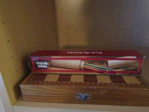 lot 187 image: Pick up sticks game, chess board with pieces