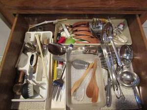 lot 212 image: Various kitchen utensils, larger cooking spoons and various cork openers