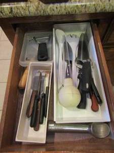lot 214 image: kitchen lot of pizza cutters, ice cream scoops, turkey baster, knives and more