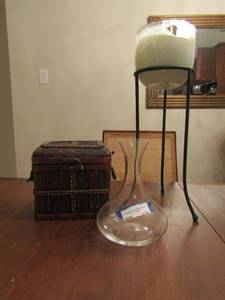 lot 124 image: wicker basket with front latch, 21 candle stand with glass bowl in top