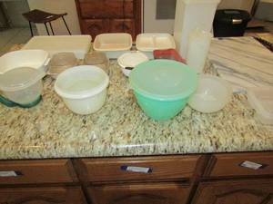 lot 224 image: Granite cutting board, Tupperware bowls with lids, bowls, bread ben