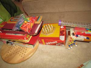 lot 234 image: Large game lot includes, equable game, Yahtzee, uno, cards, peg board and more