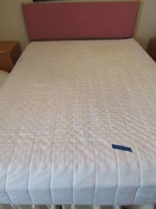 lot 174 image: Queen size pink headboard with metal rails, great for a pre teen girl