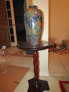 lot 4 image: Oriental Affent Vase, beautiful piece, no damage sits on a brown wood stand, size of vase is 14,    2316 table size