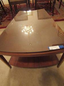 lot 331 image: Oval shaped side table with glass top, dark brown wood, 2 tier--, 182426