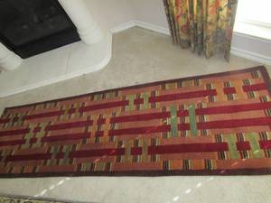 lot 77 image: Multi color hall runner rug, darker fall colors-  8ft 29
