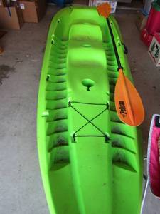 lot 18 image: Kayak green with paddle, Approx. 10ft long used but good condition