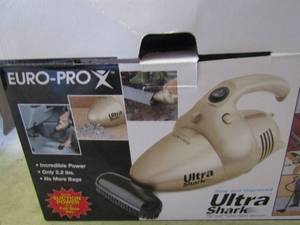 lot 369 image: Ultra shark 700 turbo hand vac, used but still works with all attatchments
