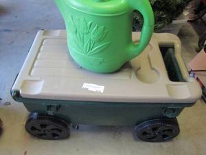 lot 370 image: Green covered wagon for gardening, small shovel, water bucket for flowers