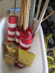 lot 375 image: Various United states Flags and flag pole with wall hook for outside house, in white small waste basket