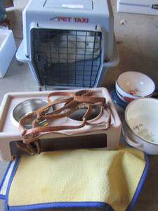 lot 374 image: Pet taxi, water and food bowl with stand, matts to place food and water on all used in good condition