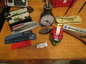 lot 397 image: Office lot includes, letter openers, small clock, staplers, filer, pen, and more