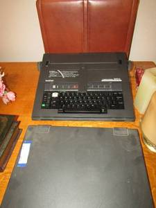 lot 403 image: Brother 300 Typewriter, brown leather breifcase