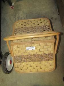 lot 415 image: Wicker picnic basket full of disposable eating utensils